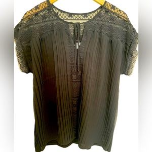 Very gently worn, New York and Company blouse. Beautiful lace cut-outs.